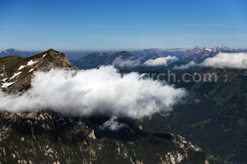 Eisenerz from the bird's eye view: Clouds on Rocky and mountainous landscape of Tullingeralm in den Ennstaler Alpen in Eisenerz in Steiermark, Austria