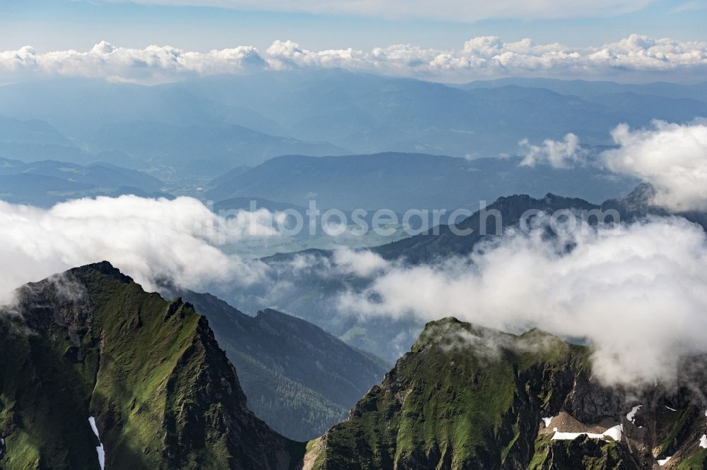 Eisenerz from above - Clouds on Rocky and mountainous landscape of Tullingeralm in den Ennstaler Alpen in Eisenerz in Steiermark, Austria
