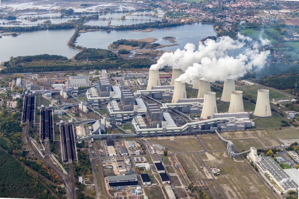 Aerial photograph Teichland - Clouds of exhaust gas in the cooling towers of the power plant Jaenschwalde, a lignite-fired thermal power plant in southeastern Brandenburg. Power plant operator is to Vattenfall Europe belonging Vattenfall Europe Generation AG, which emerged from VEAG