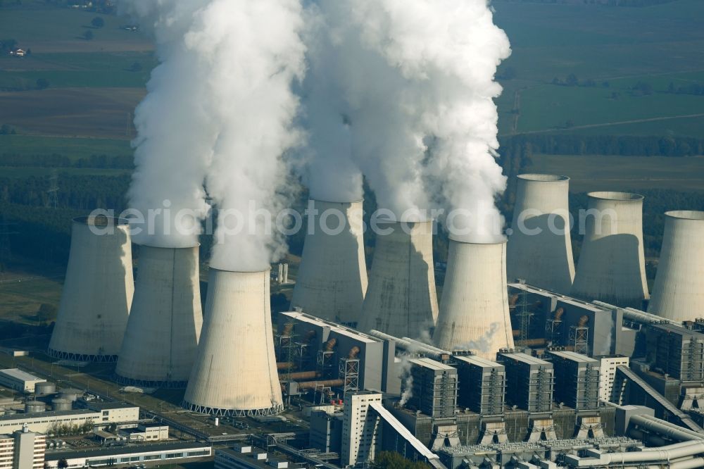 Aerial photograph Jänschwalde - Clouds of exhaust gas in the cooling towers of the power plant Jaenschwalde, a lignite-fired thermal power plant in southeastern Brandenburg. Power plant operator is to Vattenfall Europe belonging Vattenfall Europe Generation AG, which emerged from VEAG