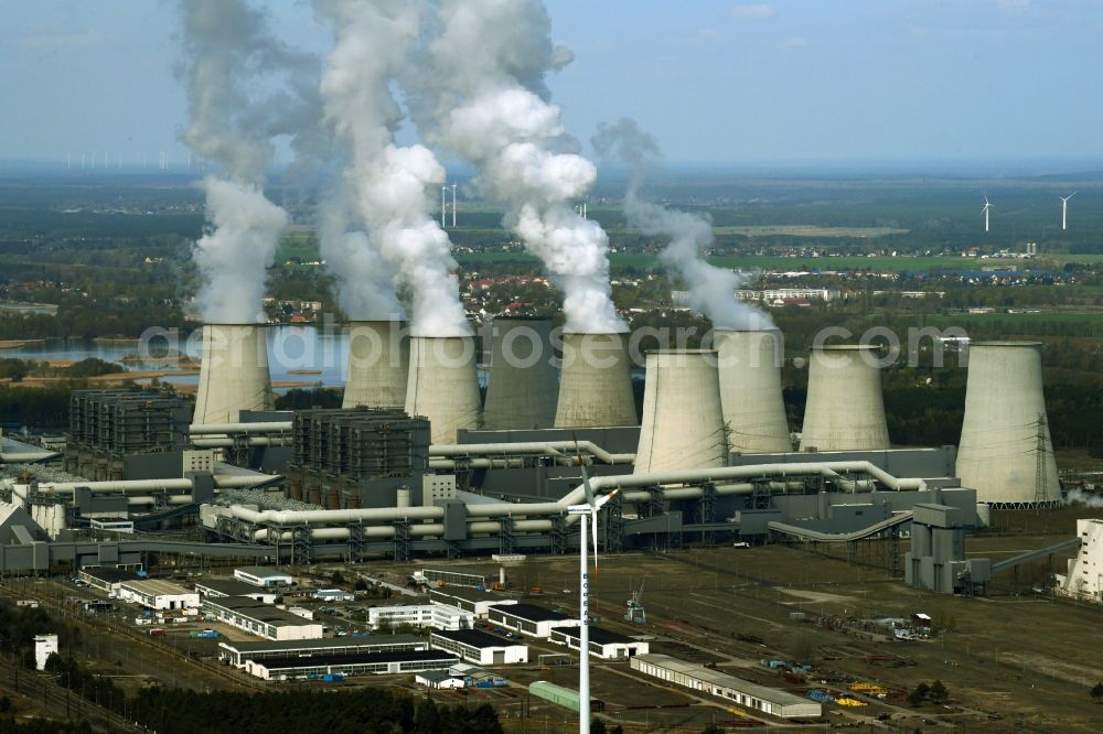 Teichland from the bird's eye view: Clouds of exhaust gas in the cooling towers of the power plant Jaenschwalde, a lignite-fired thermal power plant in southeastern Brandenburg, Germany. Power plant operator is to Vattenfall Europe belonging Vattenfall Europe Generation AG, which emerged from VEAG