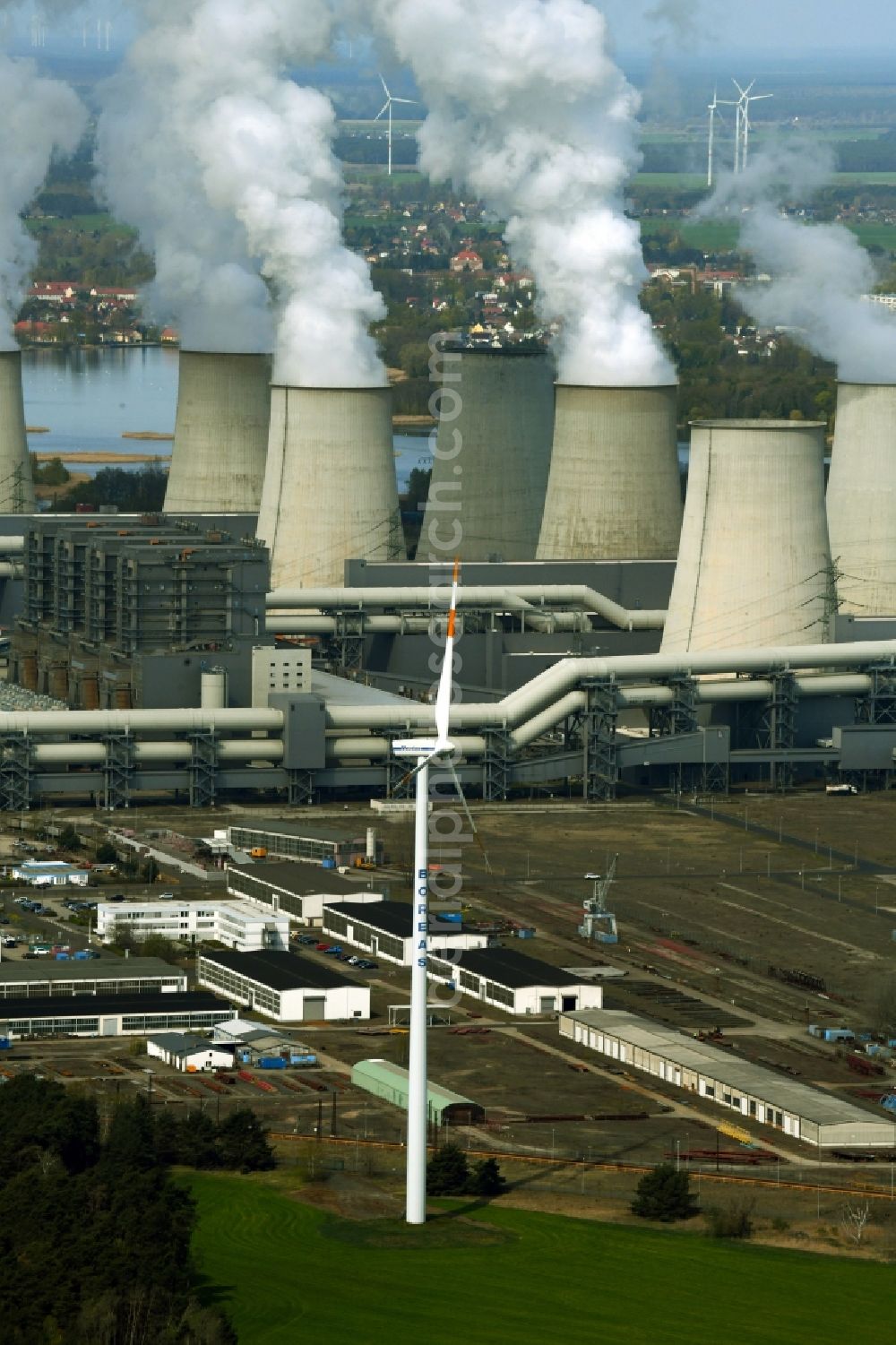 Aerial image Teichland - Clouds of exhaust gas in the cooling towers of the power plant Jaenschwalde, a lignite-fired thermal power plant in southeastern Brandenburg, Germany. Power plant operator is to Vattenfall Europe belonging Vattenfall Europe Generation AG, which emerged from VEAG