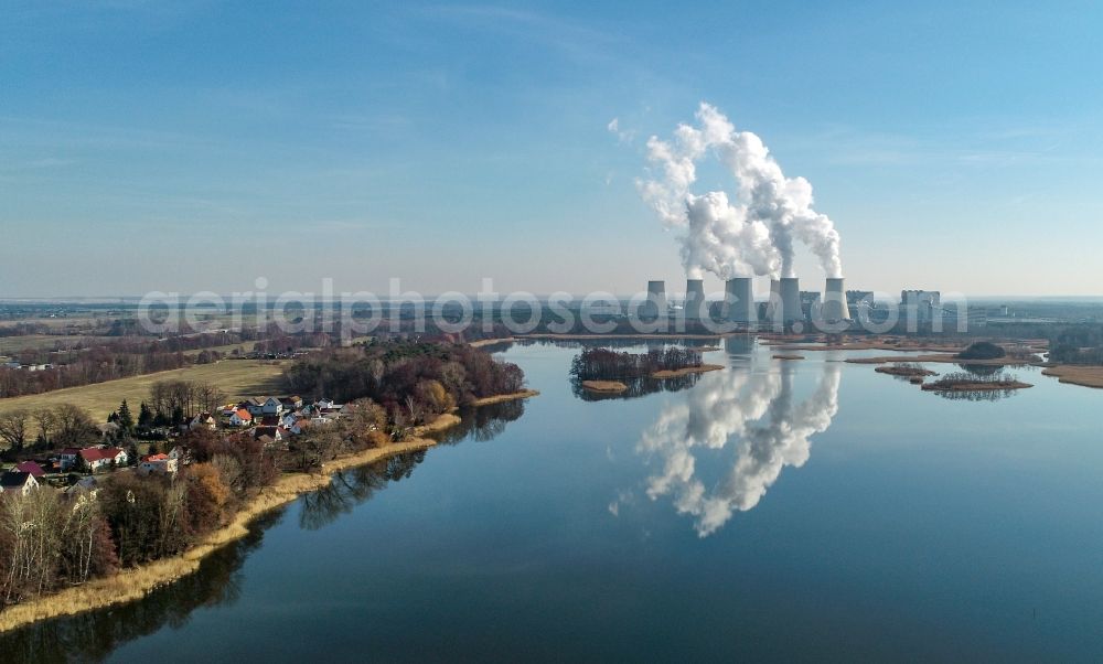 Aerial photograph Teichland - Clouds of exhaust gas in the cooling towers of the power plant Jaenschwalde, a lignite-fired thermal power plant in southeastern Brandenburg, Germany. Power plant operator is to Vattenfall Europe belonging Vattenfall Europe Generation AG, which emerged from VEAG