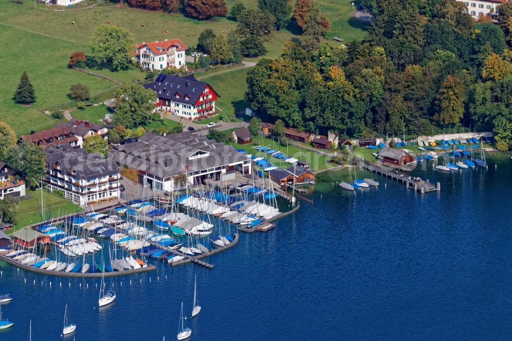 Pöcking from above - Pleasure boat marina with docks and moorings on the shore area Possenhofen in Poecking in the state Bavaria, Germany