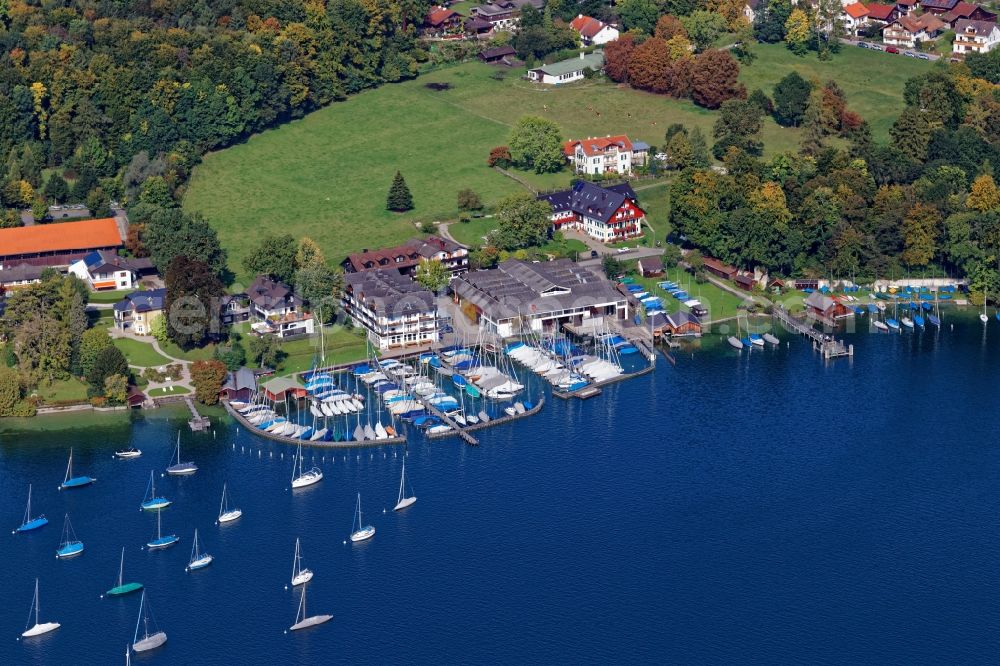 Pöcking from the bird's eye view: Pleasure boat marina with docks and moorings on the shore area Possenhofen in Poecking in the state Bavaria, Germany