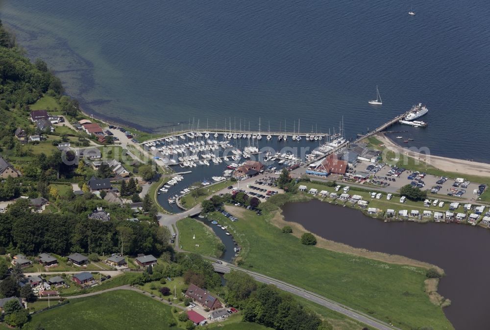 Langballig from the bird's eye view: Marina with boat moorings and steamship landing on the shore area Langballigau in Langballig in Schleswig-Holstein