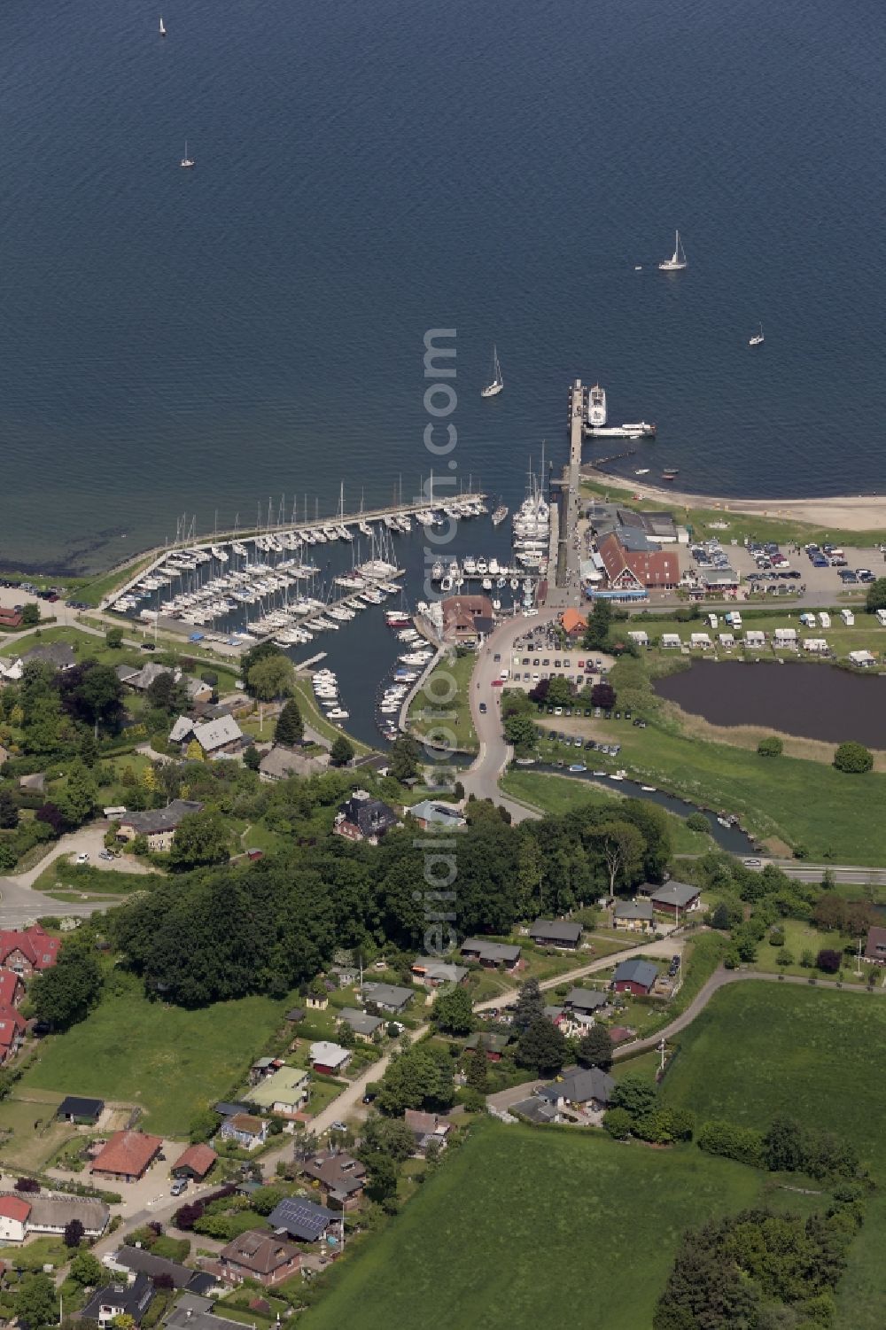 Langballig from the bird's eye view: Marina with boat moorings on the shore area Langballigau in Langballig in Schleswig-Holstein