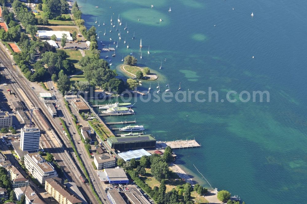 Zürich from above - Pleasure boat marina with docks and moorings on the shore area in Zuerich in Switzerland