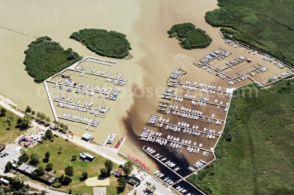 Breitenbrunn from above - Pleasure boat marina with docks and moorings on the shore area Neusiedler See in Breitenbrunn in Burgenland, Austria