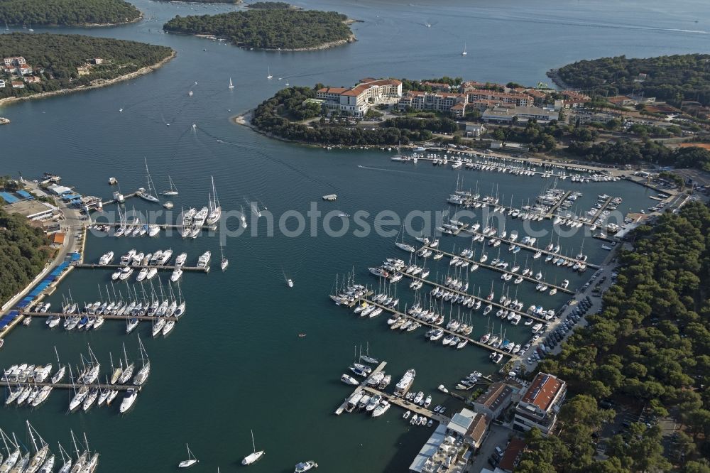 Pula from above - Pleasure boat marina with docks and moorings on the shore area Adriatic Sea in Pula in Istirien - Istarska zupanija, Croatia
