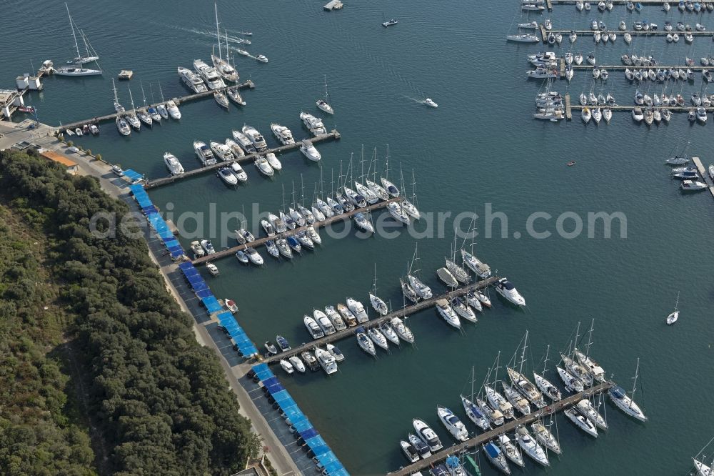 Pula from the bird's eye view: Pleasure boat marina with docks and moorings on the shore area Adriatic Sea in Pula in Istrien - Istarska zupanija, Croatia