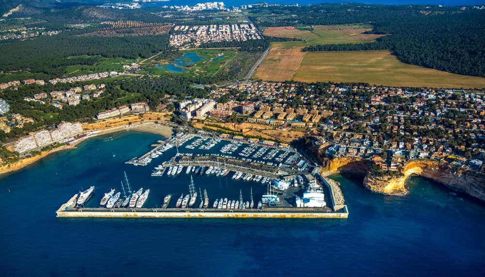 El Toro from the bird's eye view: Pleasure boat marina with docks and moorings on the shore area of Balearic Sea in El Toro in Balearic Islands, Spain