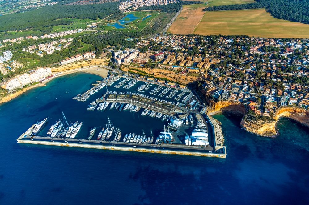 Aerial image El Toro - Pleasure boat marina with docks and moorings on the shore area of Balearic Sea in El Toro in Balearic Islands, Spain