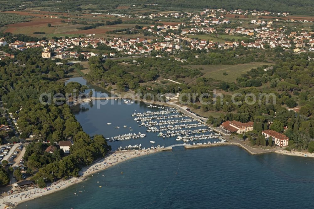 Aerial image Fazana - Pleasure boat marina with docks and moorings on the shore area in Fazana in Istria - Istarska zupanija, Croatia