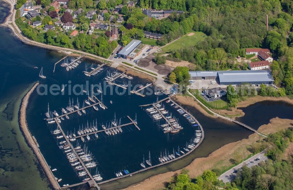 Aerial image Glücksburg - Marina with pleasure craft moorings and boat berths on the shore area of the Flensburg Fjord in Gluecksburg in Schleswig-Holstein, Germany