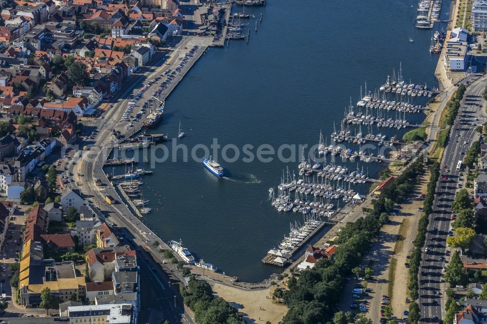 Flensburg from above - Pleasure boat marina with docks and moorings on the shore area of Hafenspitze in Flensburg in the state Schleswig-Holstein, Germany