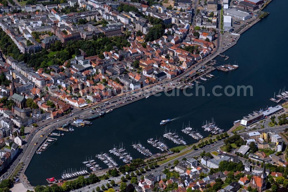 Flensburg from the bird's eye view: Pleasure boat marina with docks and moorings on the shore area of Hafenspitze in Flensburg in the state Schleswig-Holstein, Germany