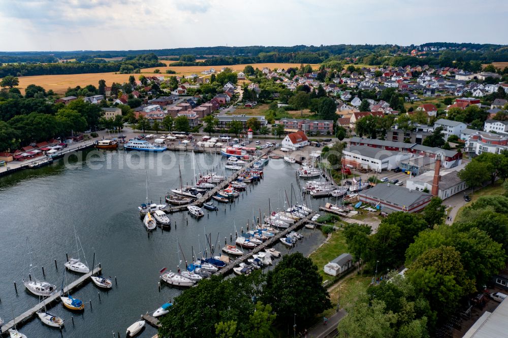 Aerial photograph Putbus - Pleasure boat marina with docks and moorings on the shore area Lauterbach in Putbus in the state Mecklenburg - Western Pomerania, Germany