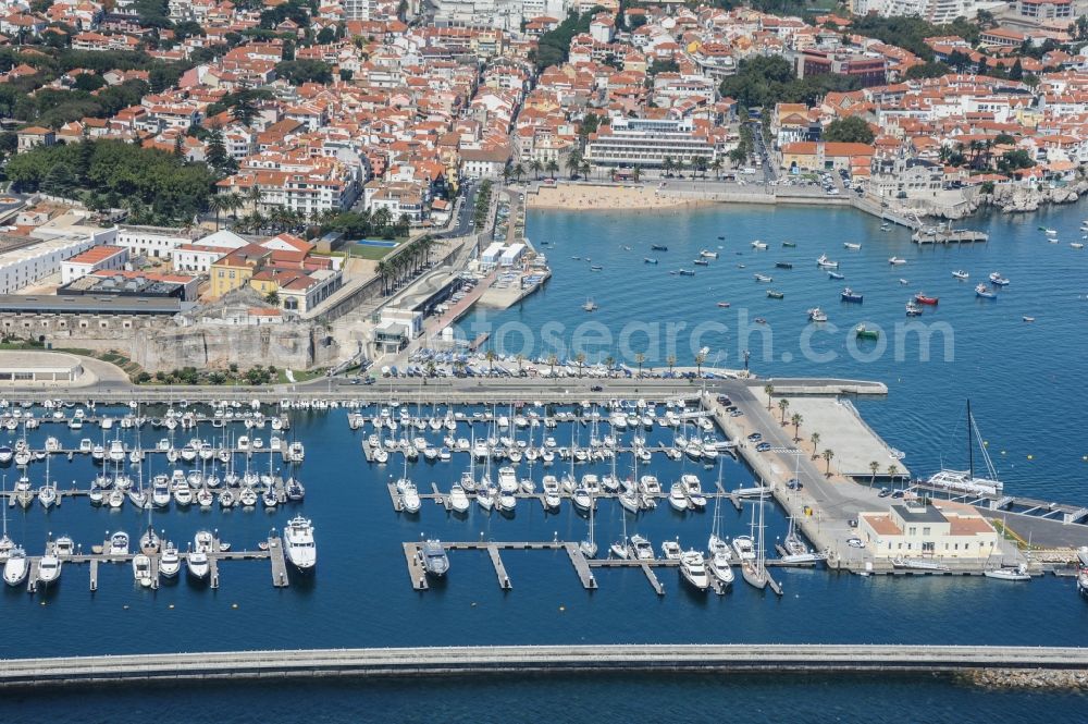 Cascais from the bird's eye view: Pleasure boat marina with docks and moorings on the shore area Marina de Cascais on Casa de Sao Bernardo in Cascais in Lisbon, Portugal