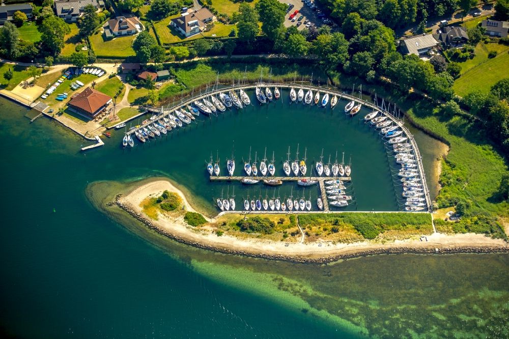 Aerial image Neustadt in Holstein - Pleasure boat marina with docks and moorings on the shore area in Neustadt in Holstein in the state Schleswig-Holstein