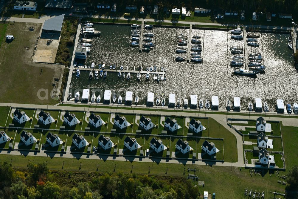 Aerial image Peenemünde - Reflecting water in the marina with sports boat moorings and boat berths on the Peenemuende shore area in Peenemuende on the island of Usedom in the state Mecklenburg - Western Pomerania, Germany.a