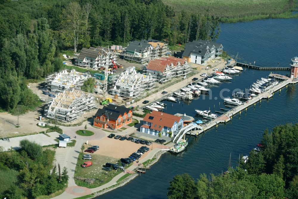 Aerial photograph Plau am See - Pleasure boat marina with docks and moorings on the shore area of Plauer See in Plau am See in the state Mecklenburg - Western Pomerania
