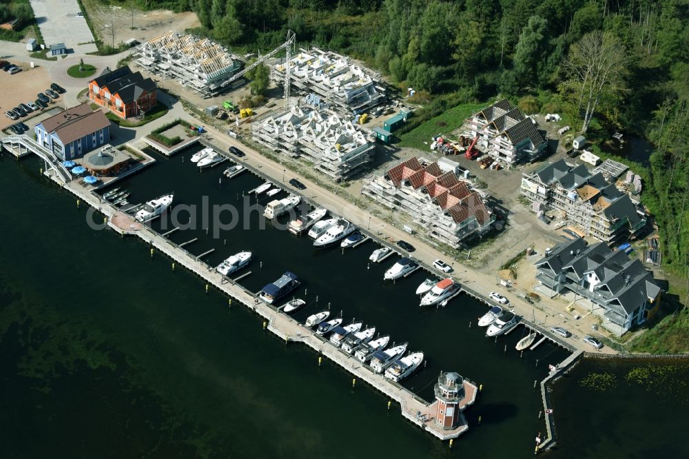 Aerial image Plau am See - Pleasure boat marina with docks and moorings on the shore area of Plauer See in Plau am See in the state Mecklenburg - Western Pomerania