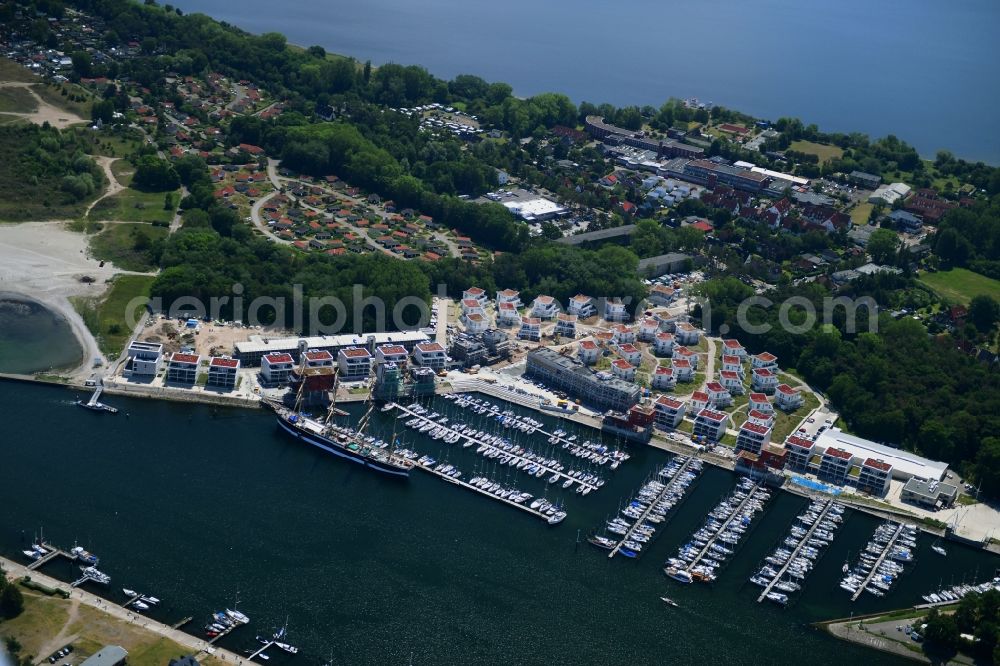 Aerial image Lübeck - Pleasure boat marina with docks and moorings on the shore area of Priwallpromenade in Travemuende in the state Schleswig-Holstein