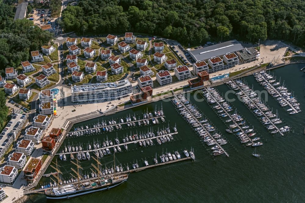 Priwall from above - Pleasure boat marina with docks and moorings on the shore area of Priwallpromenade in Travemuende in the state Schleswig-Holstein