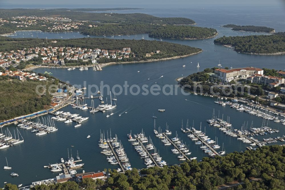 Pula from the bird's eye view: Pleasure boat marina with docks and moorings on the shore area in Pula in Istirien - Istarska zupanija, Croatia
