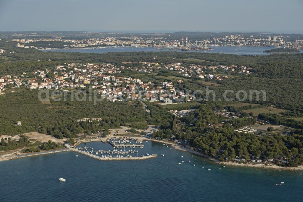 Aerial image Pula - Pleasure boat marina with docks and moorings on the shore area in Pula in Istirien - Istarska zupanija, Croatia