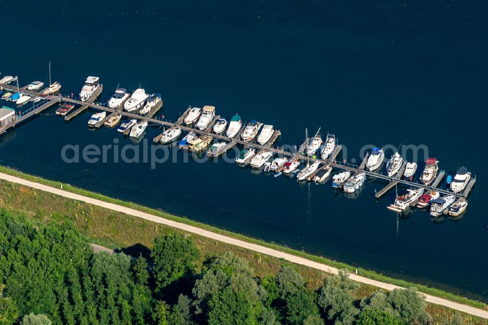 Weisweil from above - Pleasure boat marina with docks and moorings on the shore area on Rhein in Weisweil in the state Baden-Wurttemberg, Germany