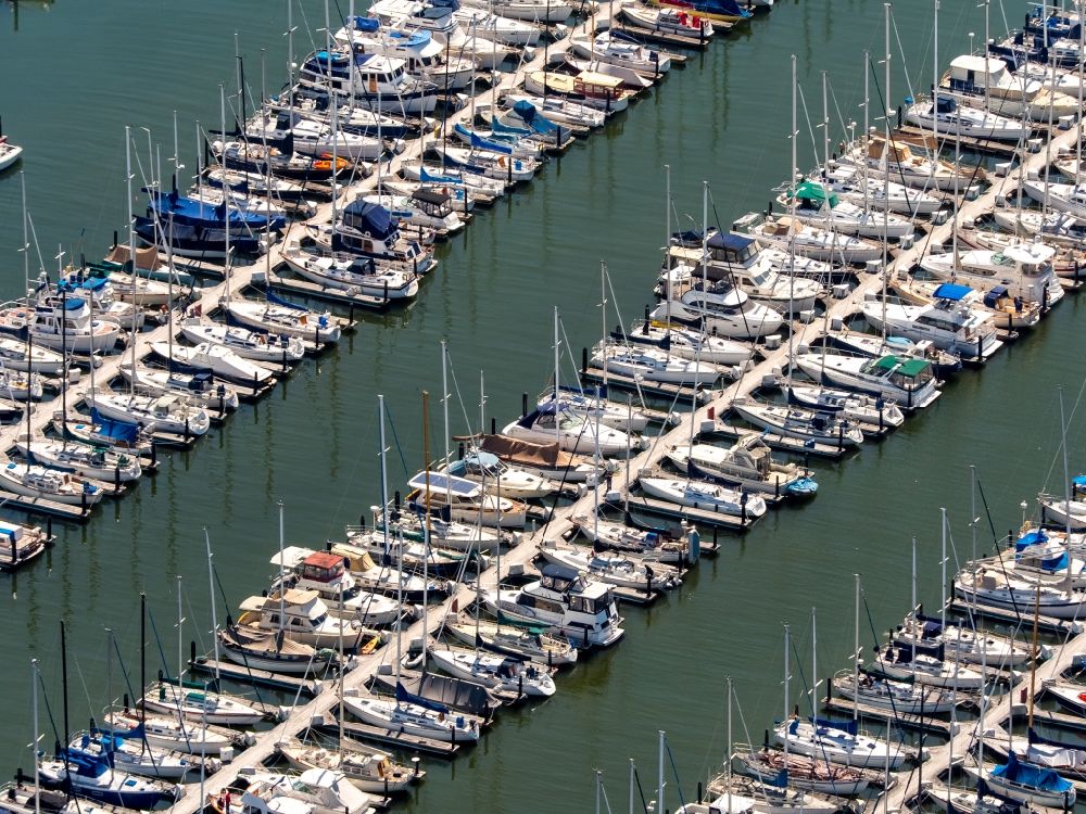 Aerial image Sausalito - Pleasure boat marina with docks and moorings on the shore area Richardson Bay - Bridgeway in Sausalito California in USA
