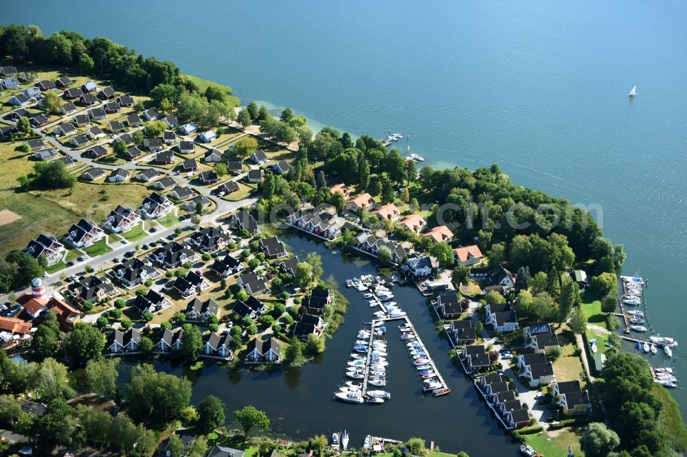 Wendisch Rietz from above - Pleasure boat marina with docks and moorings on the shore area des Scharmuetzelsees in Wendisch Rietz in the state Brandenburg