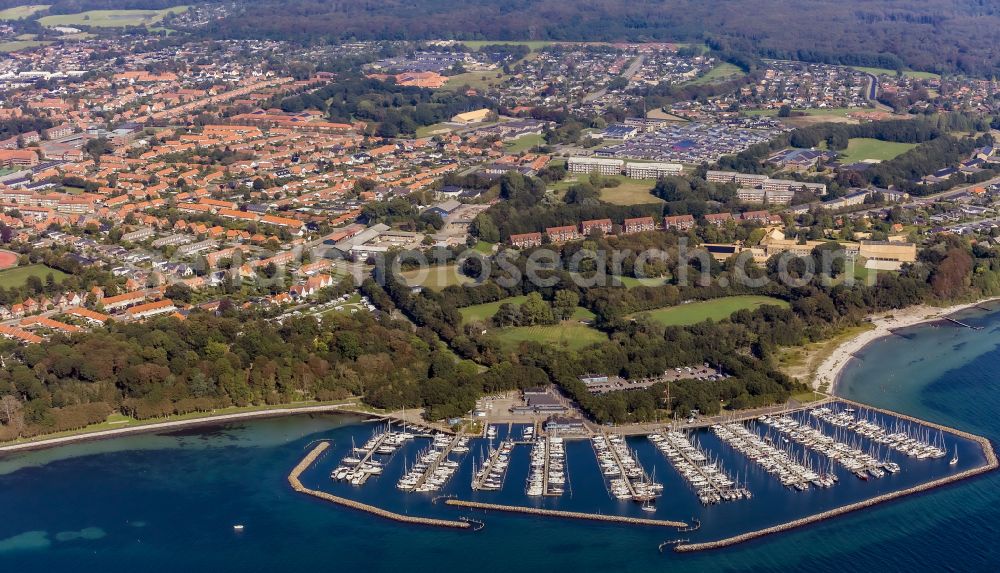 Sonderborg from the bird's eye view: Pleasure boat marina with docks and moorings on the shore area in Sonderborg in Denmark