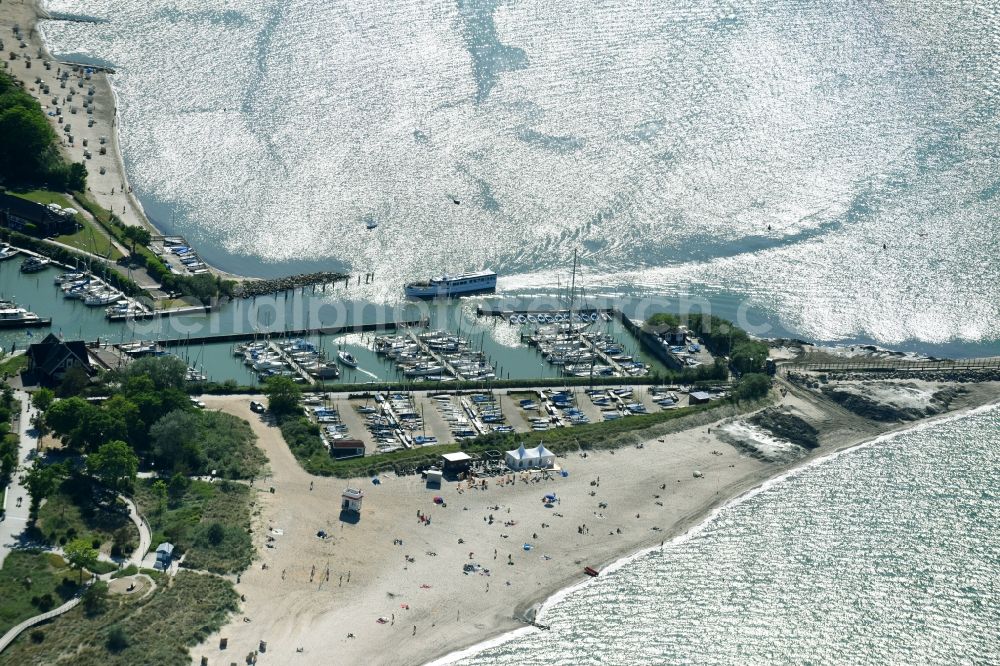 Aerial image Niendorf/Ostsee - Pleasure boat marina with docks and moorings on the shore area on Strandstrasse in Niendorf/Ostsee in the state Schleswig-Holstein, Germany