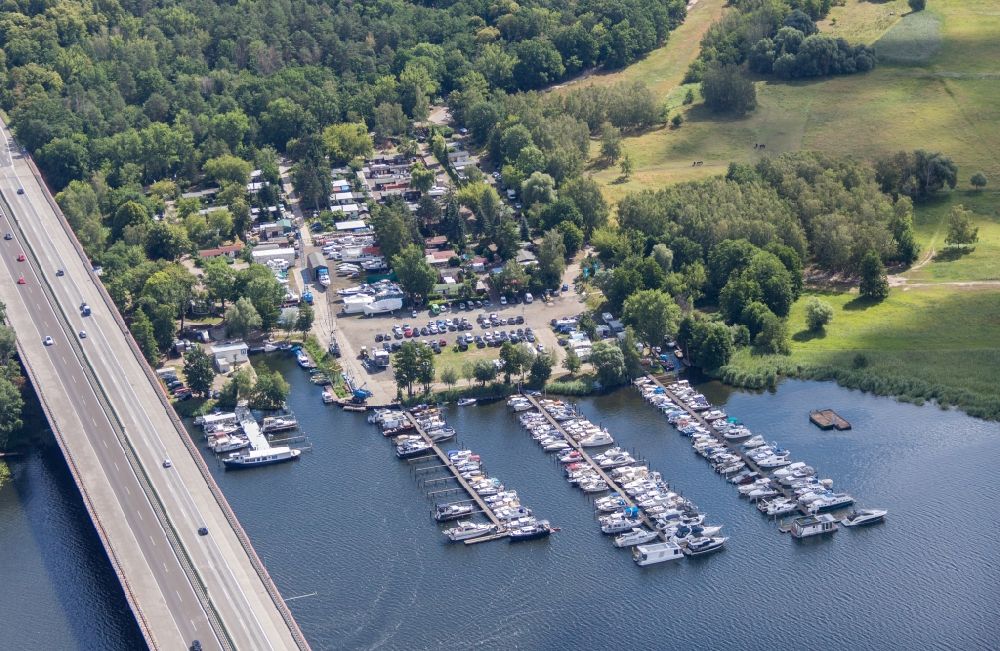 Werder (Havel) from the bird's eye view: Pleasure boat marina with docks and moorings on the shore area Yachthafen Ringel in Werder (Havel) in the state Brandenburg, Germany