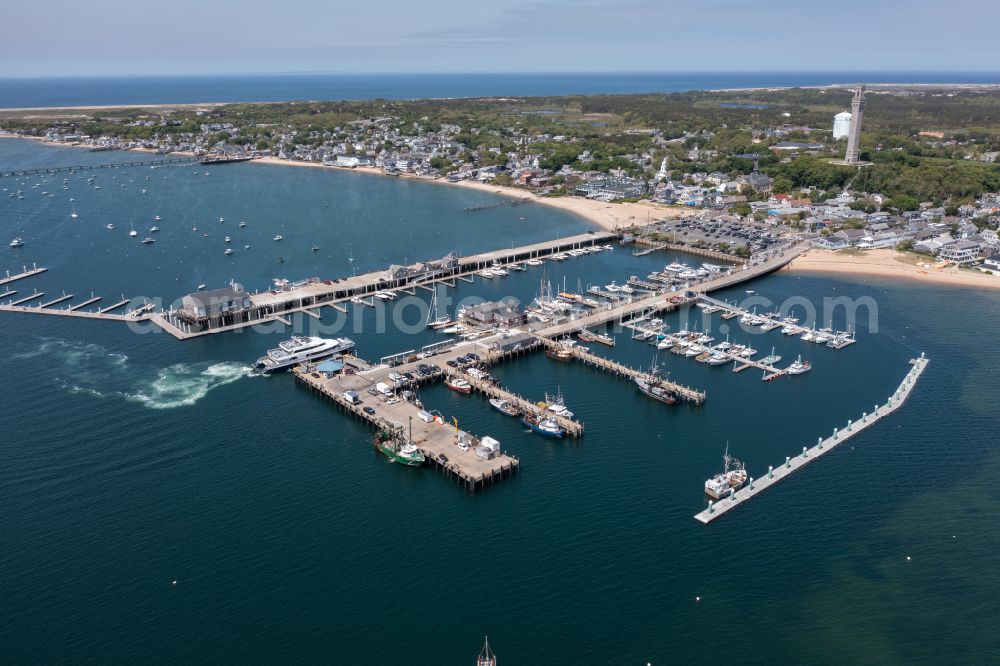 Aerial image Provincetown - Pleasure boat marina with docks and moorings on the shore area MacMillan Pier in Provincetown in Massachusetts, United States of America