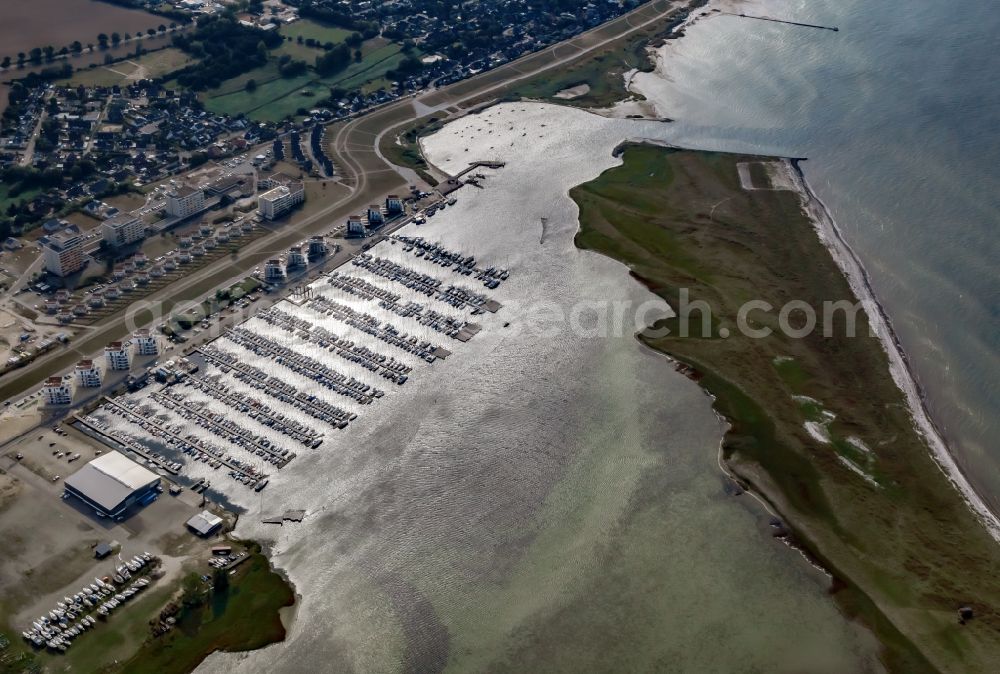 Aerial image Wendtorf - Marina with sports boat moorings, boat moorings and holiday park on the shore area Marina Wendtorf in Wendtorf in the state Schleswig-Holstein, Germany