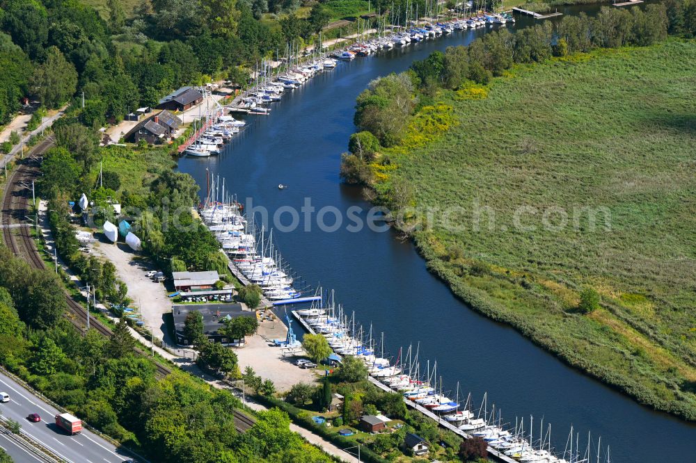 Aerial image Lübeck - Pleasure boat marina with docks and moorings on the shore area Stettiner Yacht-Club e.V. on street Zur Teerhofsinsel in the district Falkenfeld - Vorwerk in Luebeck at the baltic sea coast in the state Schleswig-Holstein, Germany