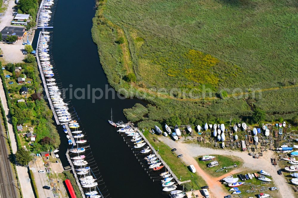 Lübeck from the bird's eye view: Pleasure boat marina with docks and moorings on the shore area Stettiner Yacht-Club e.V. on street Zur Teerhofsinsel in the district Falkenfeld - Vorwerk in Luebeck at the baltic sea coast in the state Schleswig-Holstein, Germany