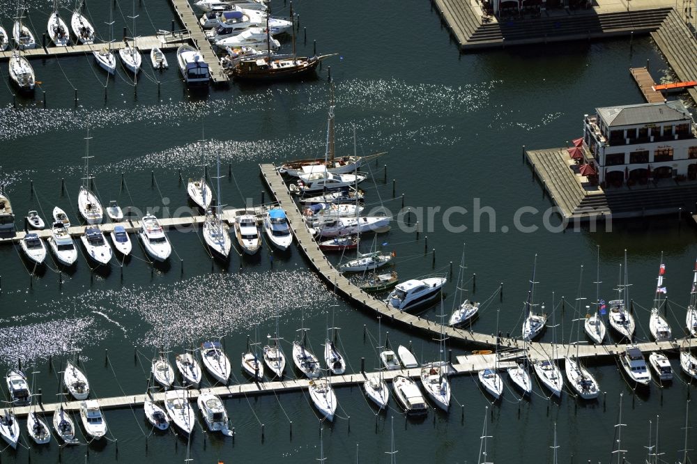 Aerial image Rostock - Pleasure boat marina with docks and moorings on the shore area of baltic see in Rostock in the state Mecklenburg - Western Pomerania