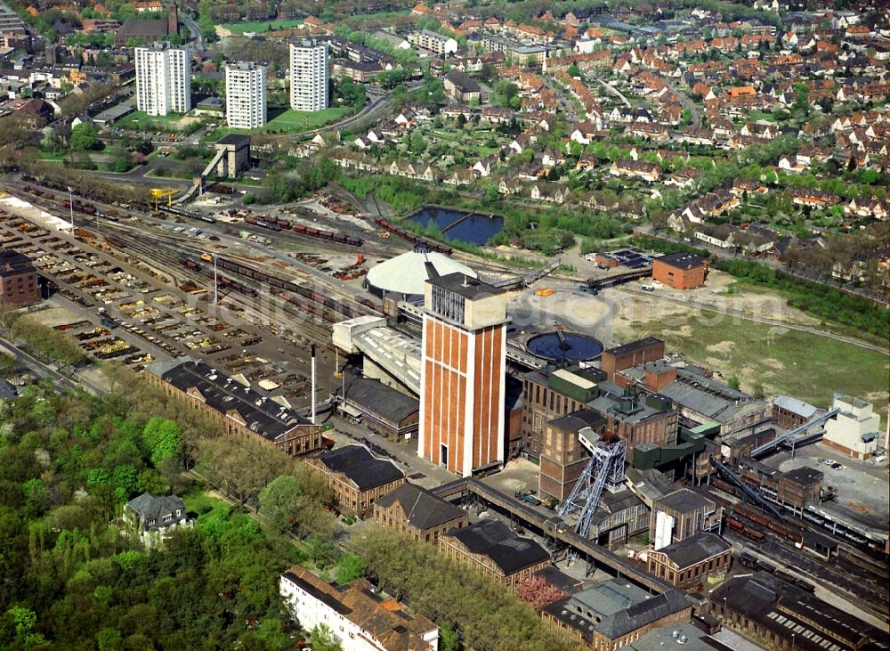 Aerial photograph Kamp-Lintfort - The coalmine Friedrich Heinrich with the shafts I and II is a former coal mine in Kamp-Lintfort in North Rhine-Westphalia. The vast workings of the mine and the resultant headframe above the shaft 2 are considered monument worthy, but not under a preservation order. It is part of the Route of Industrial Heritage of the Rhenish mining route