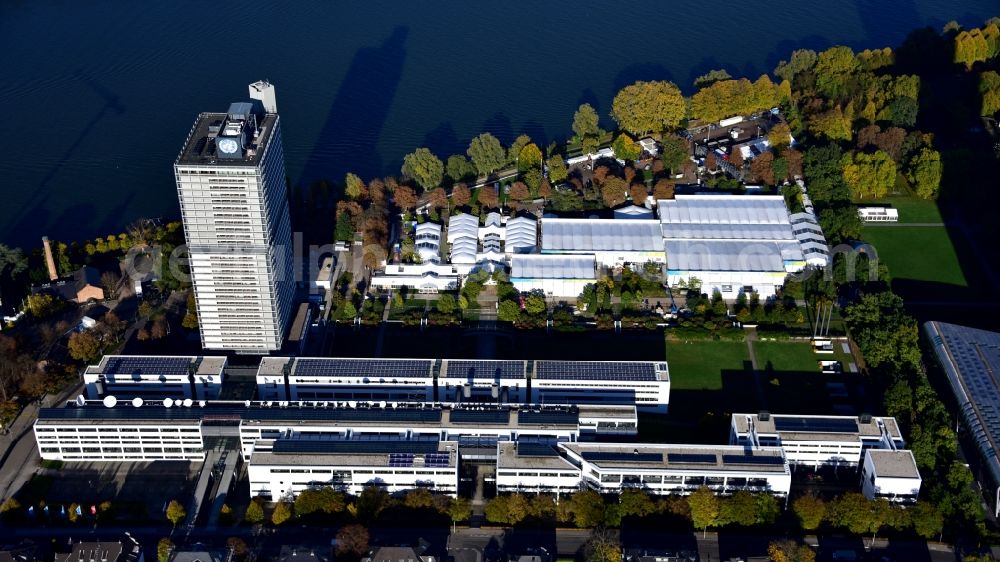Aerial photograph Bonn - Tent construction and assembly at the venue UN- Climate Conference in the area of the UN Campus in Bonn in the state North Rhine-Westphalia, Germany.On the left the skyscraper Langer Eugen, including the buildings of the Deutsche Welle