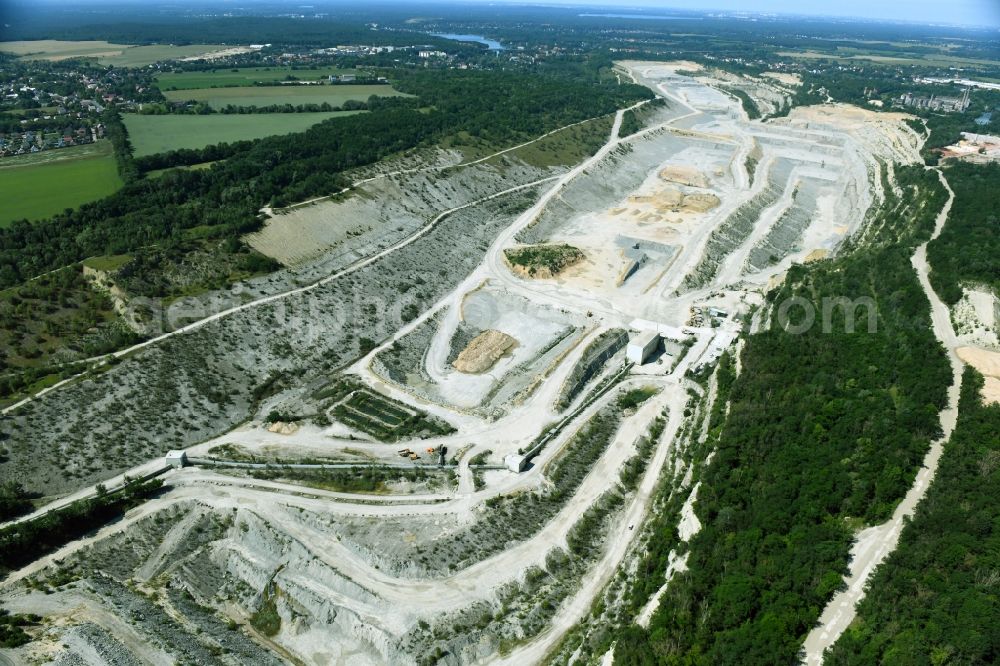 Rüdersdorf from the bird's eye view: Site and Terrain of overburden surfaces Cement opencast mining CEMEX in Ruedersdorf in the state Brandenburg, Germany
