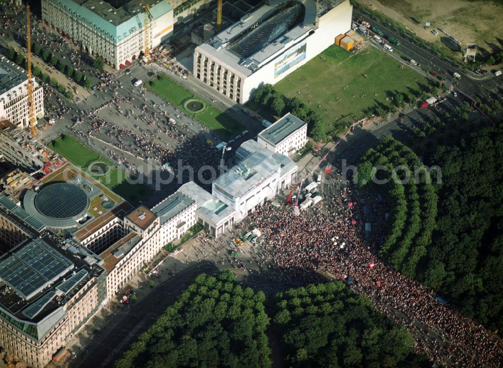 Berlin from above - Loveparade on landmark Brandenburg Gate on Pariser Platz and the street of the 17th June in Berlin - Mitte