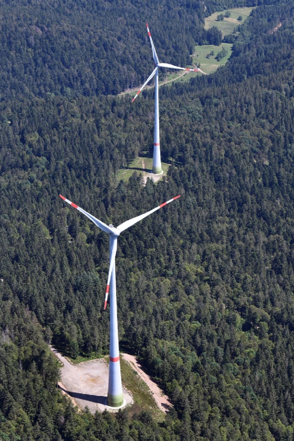 Schopfheim from above - Two wind turbines on the Rohrenkopf, the local mountain of Gersbach, a district of Schopfheim in Baden-Wuerttemberg. It was the first wind farm in the south of the Black Forest