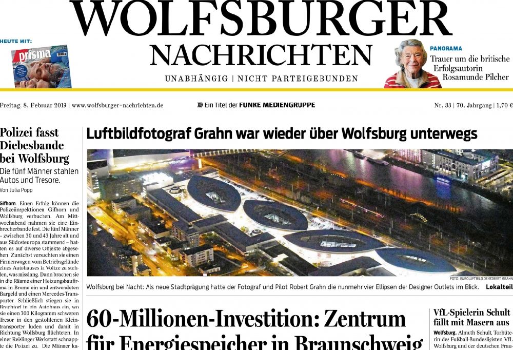 Aerial image at night Wolfsburg - Picture Section / media use of night aerial use in the Newspaper - daily paper WOLFSBURGER NACHRICHTEN , added to in Wolfsburg in the state Lower Saxony, Germany