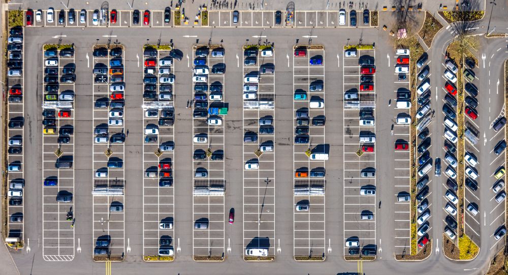 Vertical aerial photograph Wesel - Vertical aerial view from the satellite perspective of the parking space for parked cars at the shopping center in the district Obrighoven-Lackhausen in Wesel at Ruhrgebiet in the state North Rhine-Westphalia, Germany