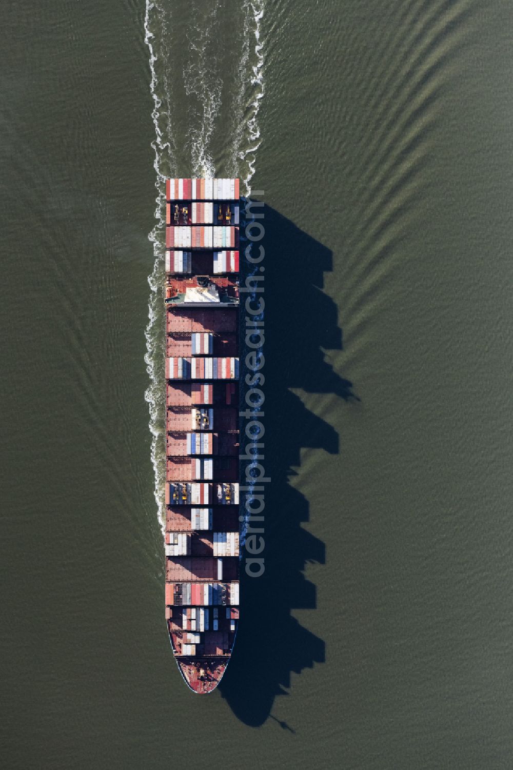 Vertical aerial photograph Bremerhaven - Vertical aerial view from the satellite perspective of the container ship on the Outer Weser in the Wadden Sea in Wurster North Sea Coast in the state Lower Saxony, Germany